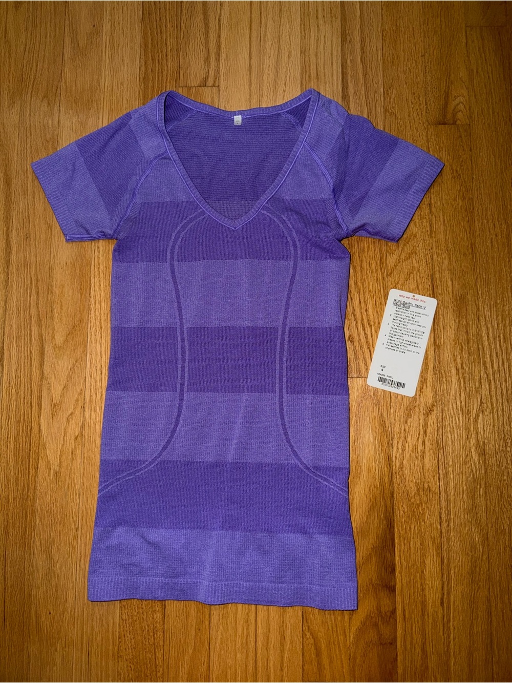 Lululemon Run: Swiftly Tech V Neck
Power Purple  - size 4